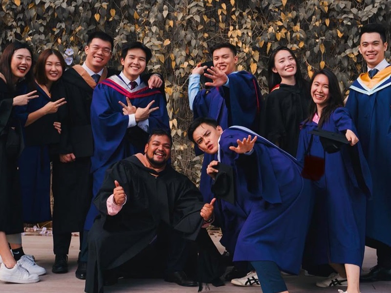 8 NP's BA alumni in their graduation gowns